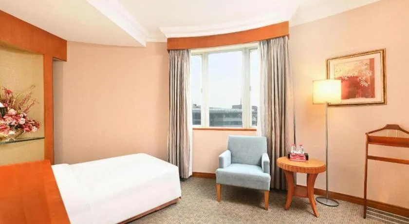 Bed in Haihua Hotel Hangzhou