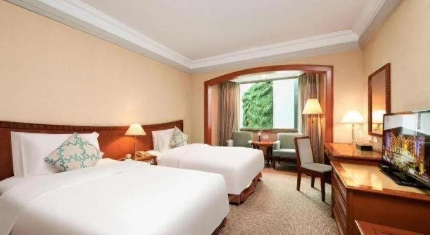 Bed in Haihua Hotel Hangzhou