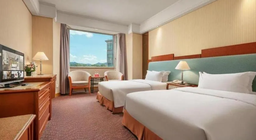 Bed in Haihua Hotel Hangzhou