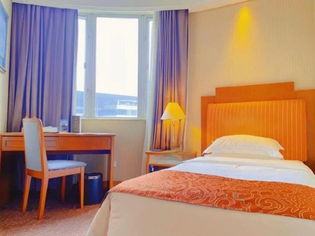 Bed in Haihua Hotel Hangzhou