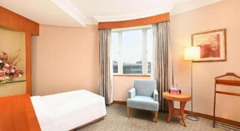 Bed in Haihua Hotel Hangzhou