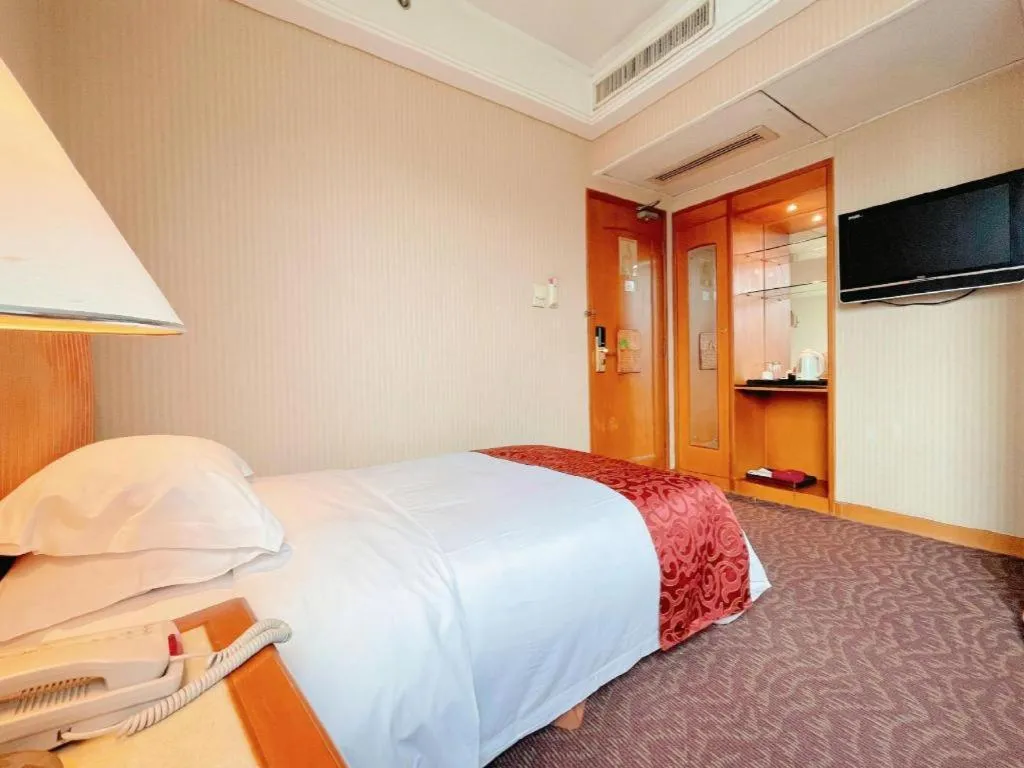 Bed in Haihua Hotel Hangzhou