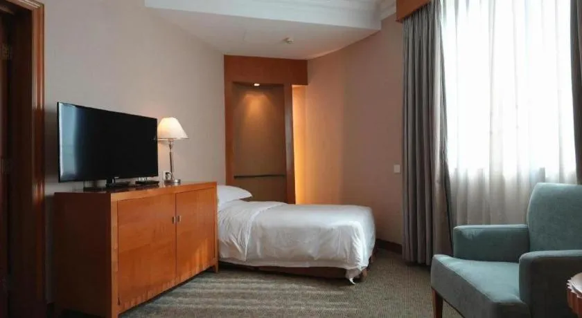 Bed in Haihua Hotel Hangzhou