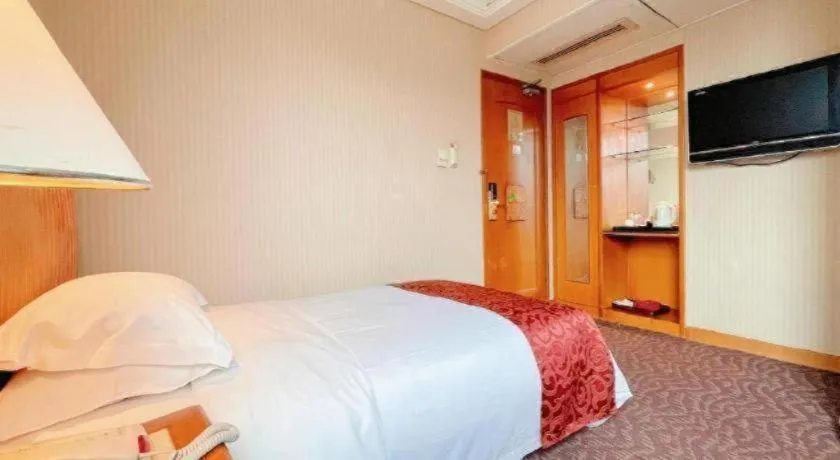 Bed in Haihua Hotel Hangzhou