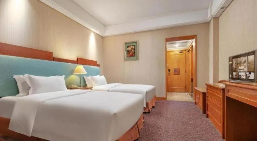 Bed in Haihua Hotel Hangzhou