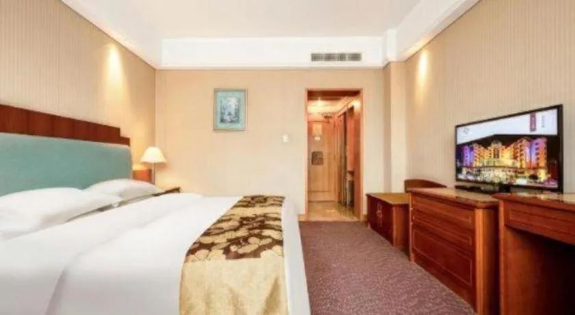 Bed in Haihua Hotel Hangzhou