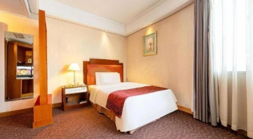 Bed in Haihua Hotel Hangzhou