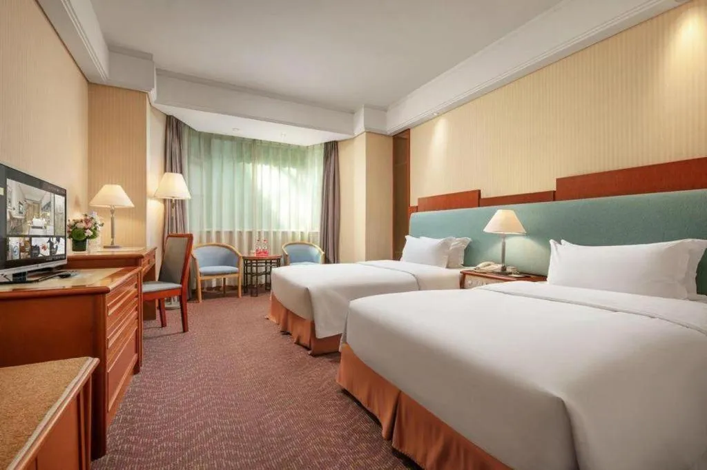 Bed in Haihua Hotel Hangzhou