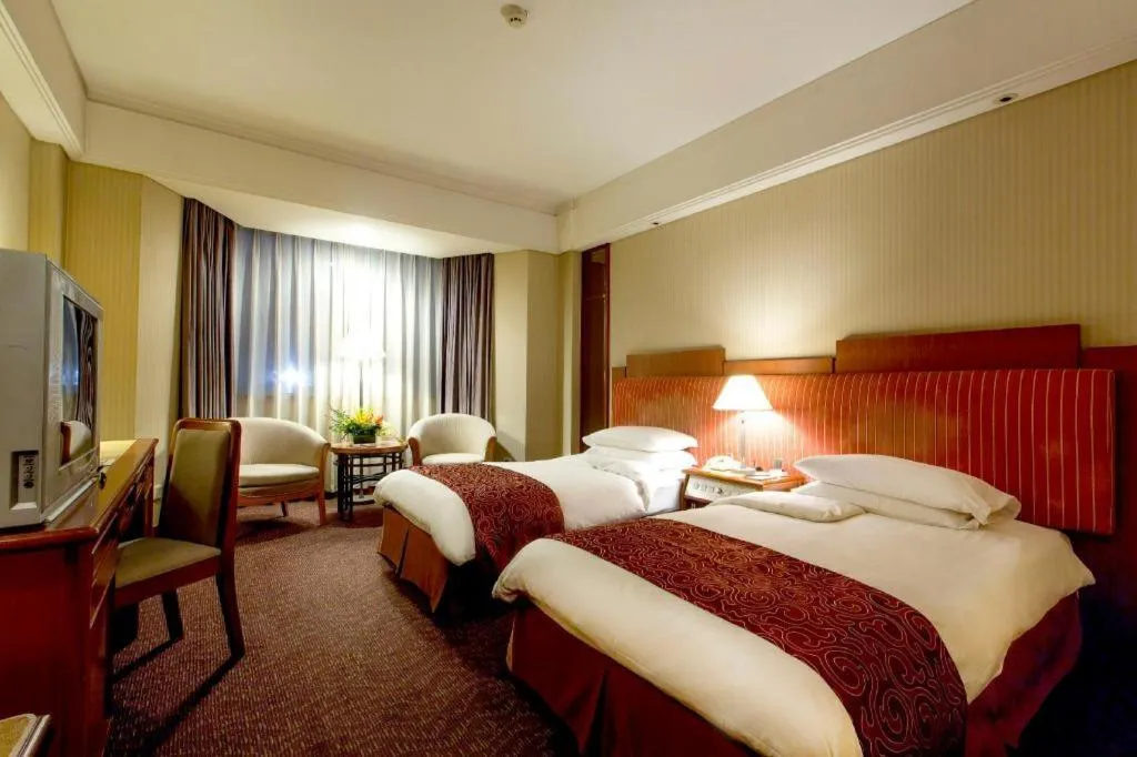 Bed in Haihua Hotel Hangzhou