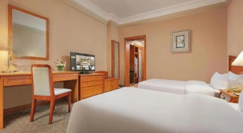 Bed in Haihua Hotel Hangzhou