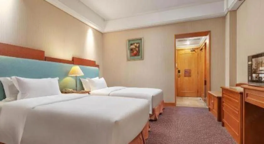 Bed in Haihua Hotel Hangzhou