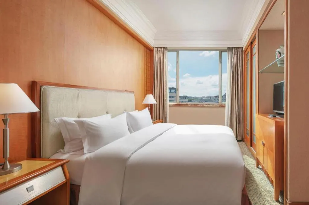 Bed in Haihua Hotel Hangzhou