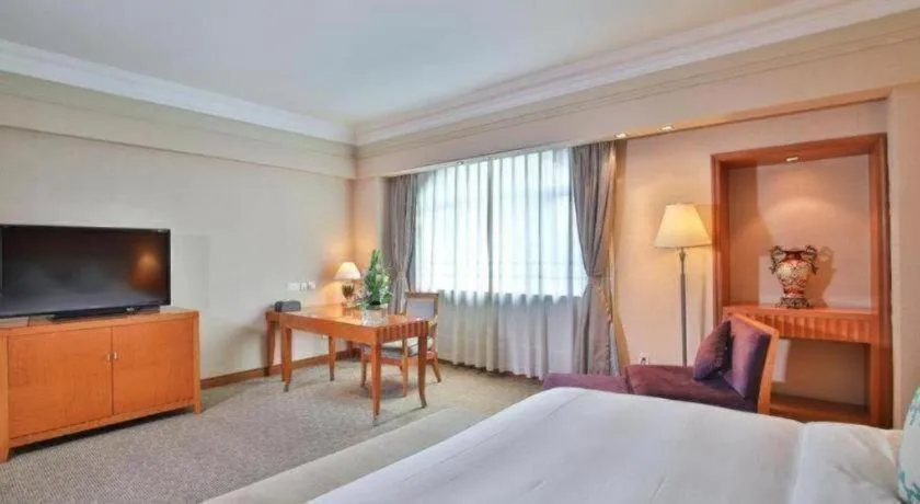 Bed in Haihua Hotel Hangzhou