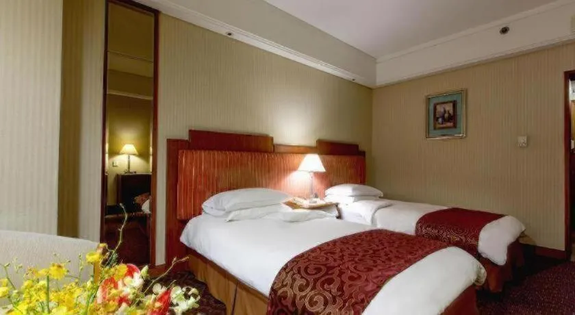 Bed in Haihua Hotel Hangzhou