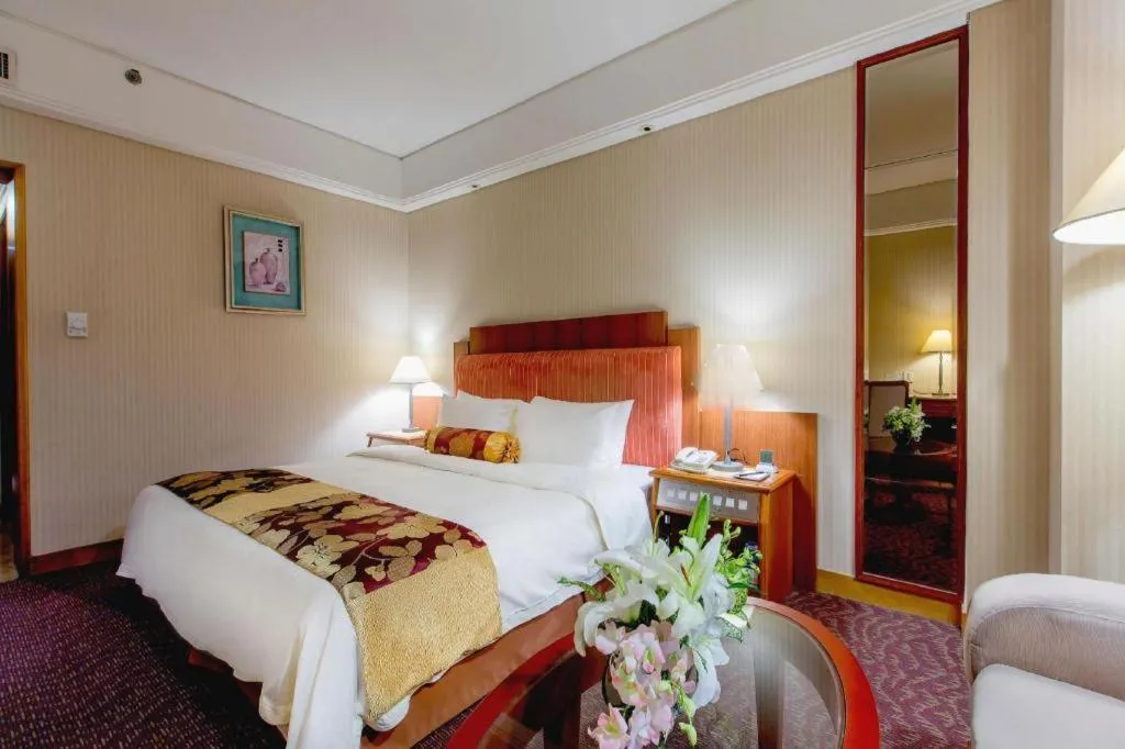 Bed in Haihua Hotel Hangzhou