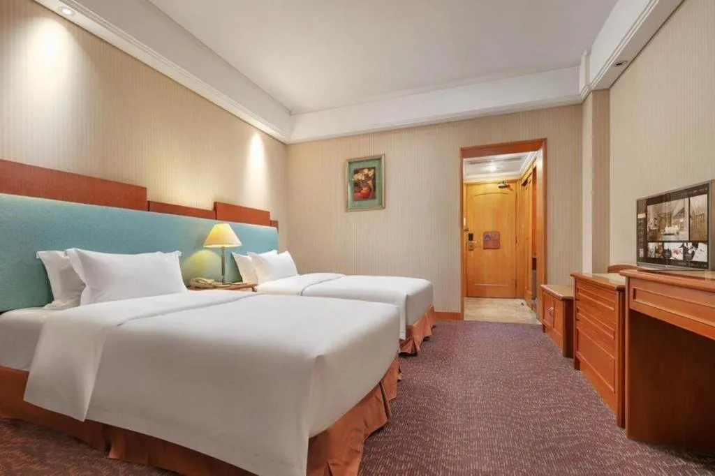 Bed in Haihua Hotel Hangzhou