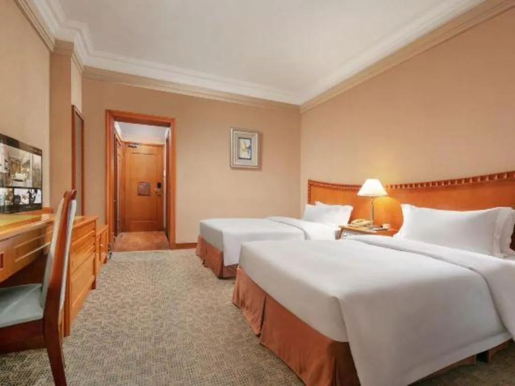 Bed in Haihua Hotel Hangzhou