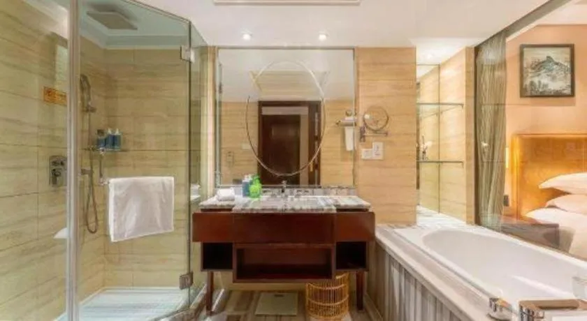 Bed in Maison New Century Hotel Ningbo