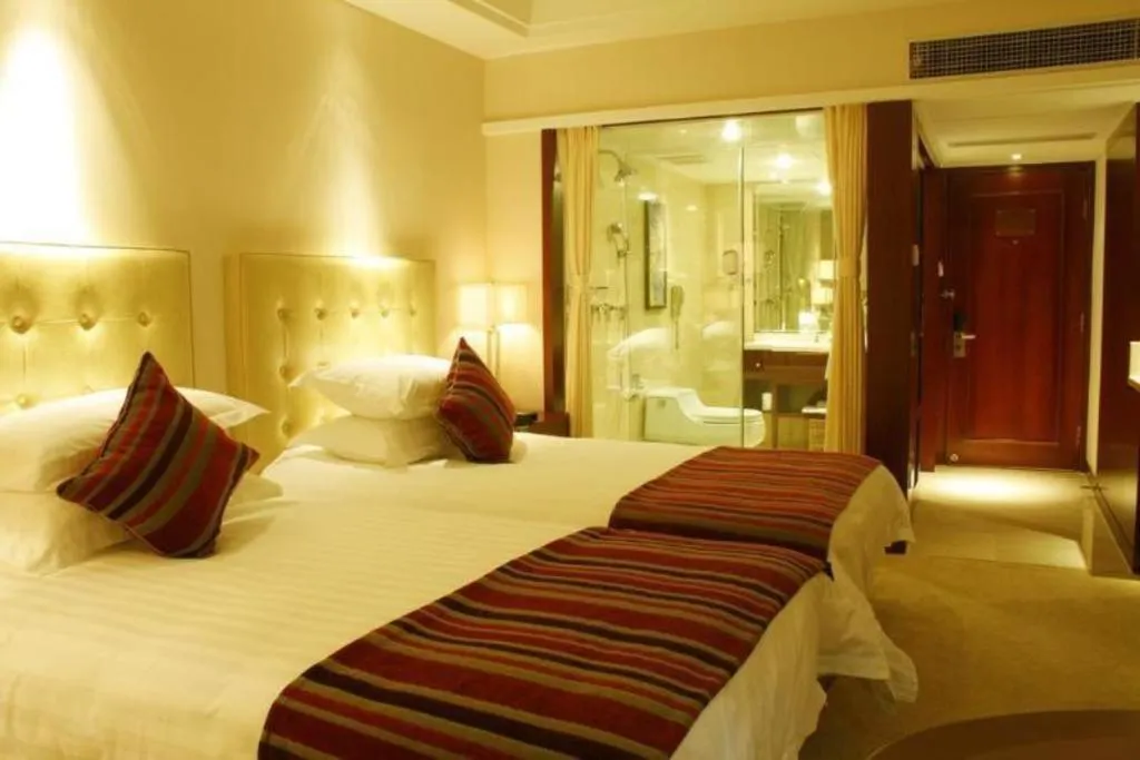 Bed in Maison New Century Hotel Ningbo