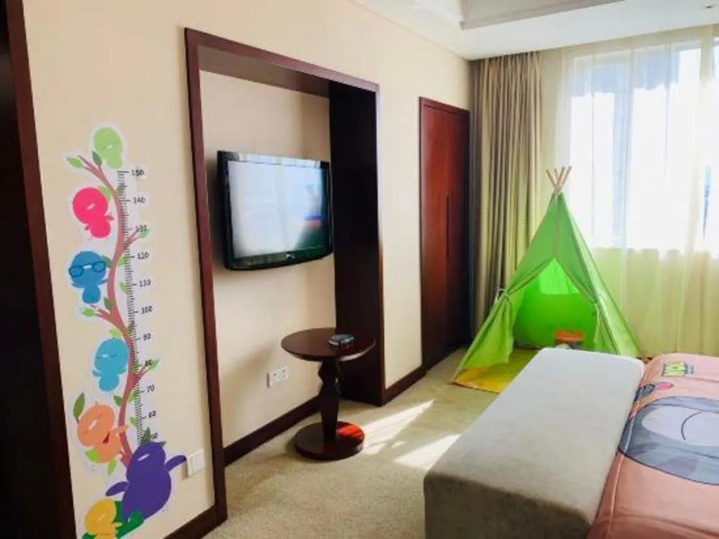 Bed in Maison New Century Hotel Ningbo