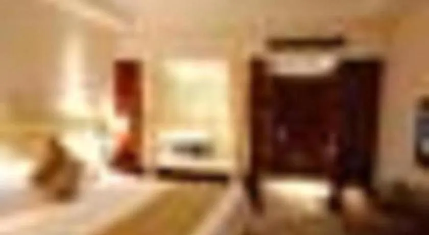 Bed in Maison New Century Hotel Ningbo