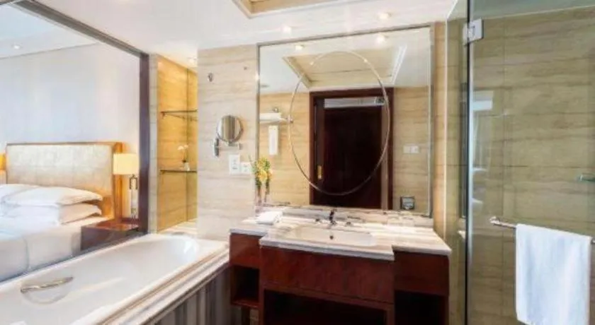 Bed in Maison New Century Hotel Ningbo