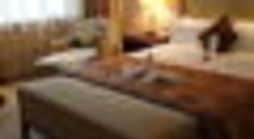 Bed in Maison New Century Hotel Ningbo