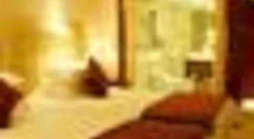 Bed in Maison New Century Hotel Ningbo