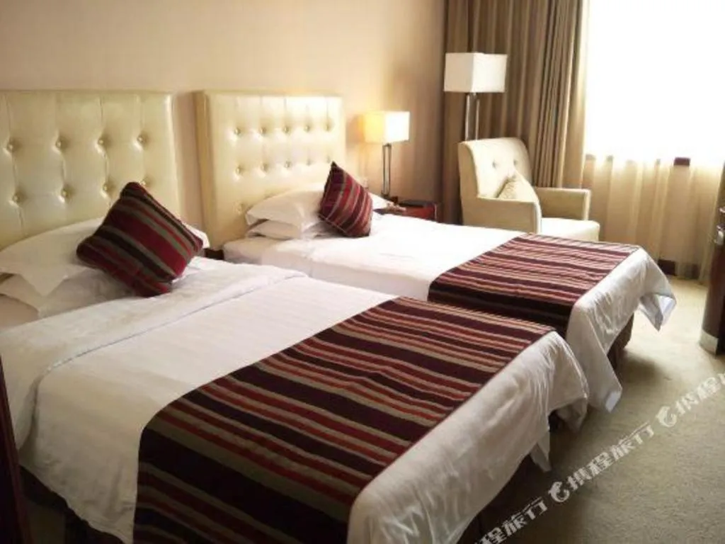 Bed in Maison New Century Hotel Ningbo