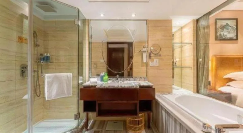 Bed in Maison New Century Hotel Ningbo