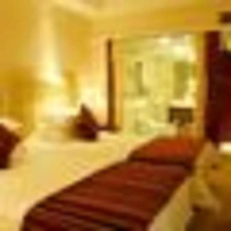 Bed in Maison New Century Hotel Ningbo