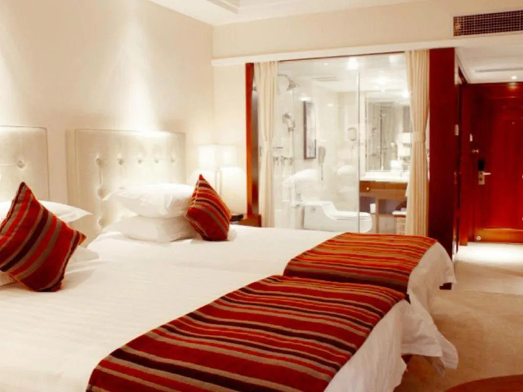 Bed in Maison New Century Hotel Ningbo