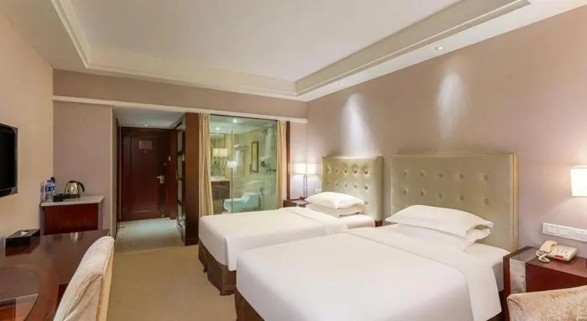 Bed in Maison New Century Hotel Ningbo