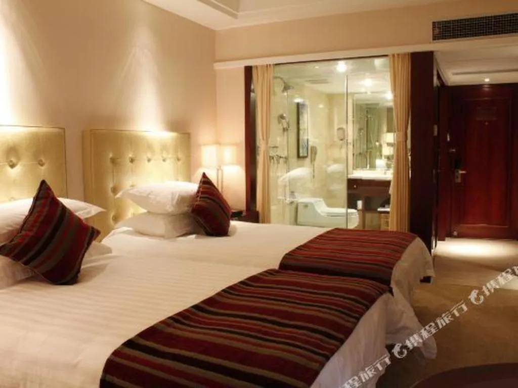 Bed in Maison New Century Hotel Ningbo