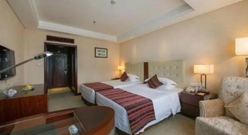 Bed in Maison New Century Hotel Ningbo