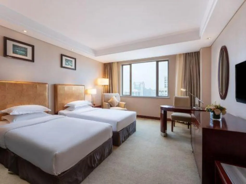 Bed in Maison New Century Hotel Ningbo