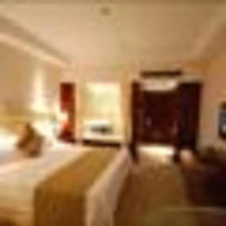 Bed in Maison New Century Hotel Ningbo