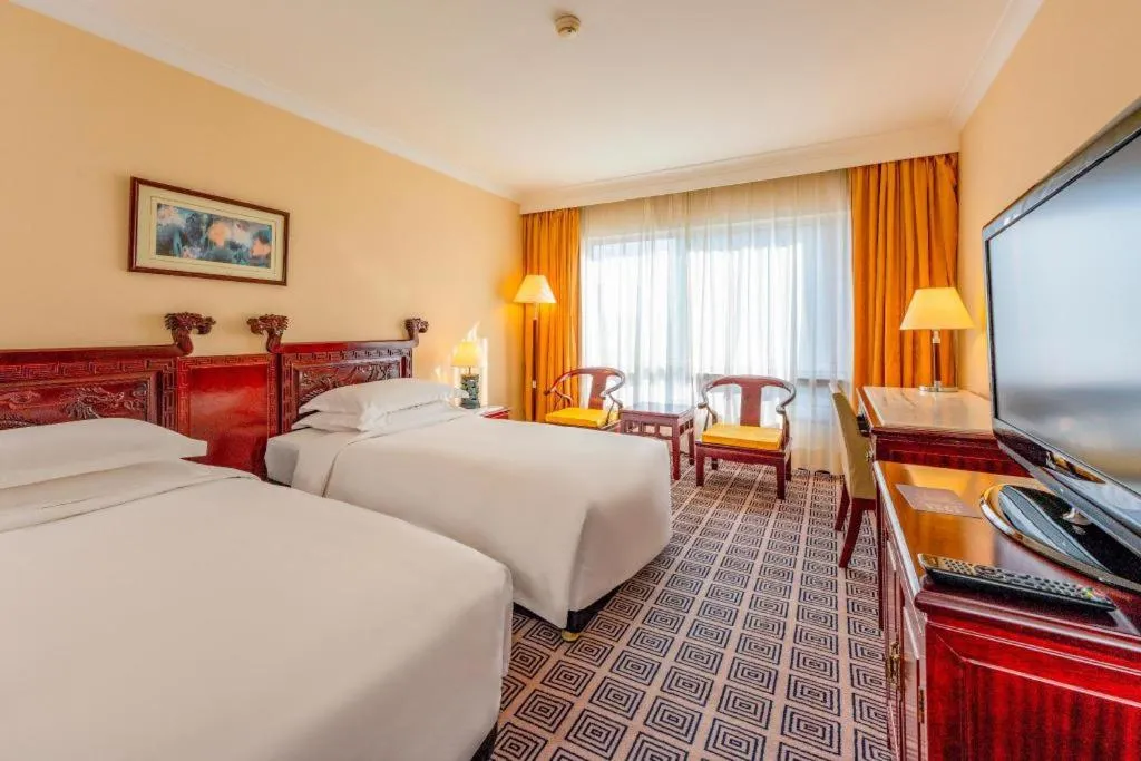 Bed in Grand Skylight Hotel Royal, Beijing