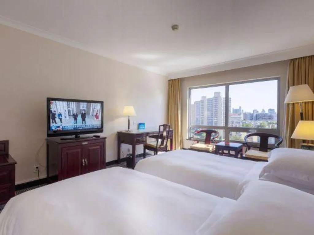 Bed in Grand Skylight Hotel Royal, Beijing