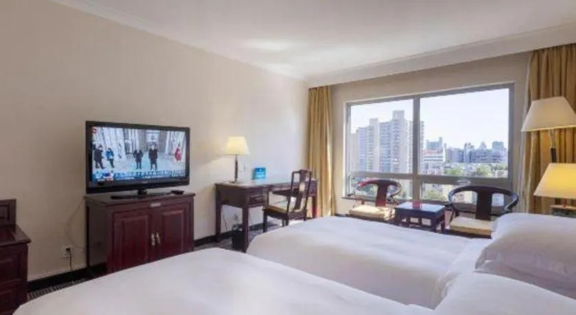 Bed in Grand Skylight Hotel Royal, Beijing