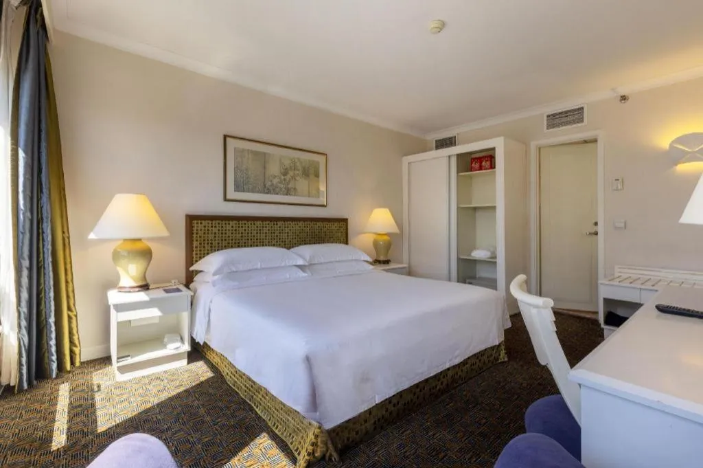 Bed in Grand Skylight Hotel Royal, Beijing