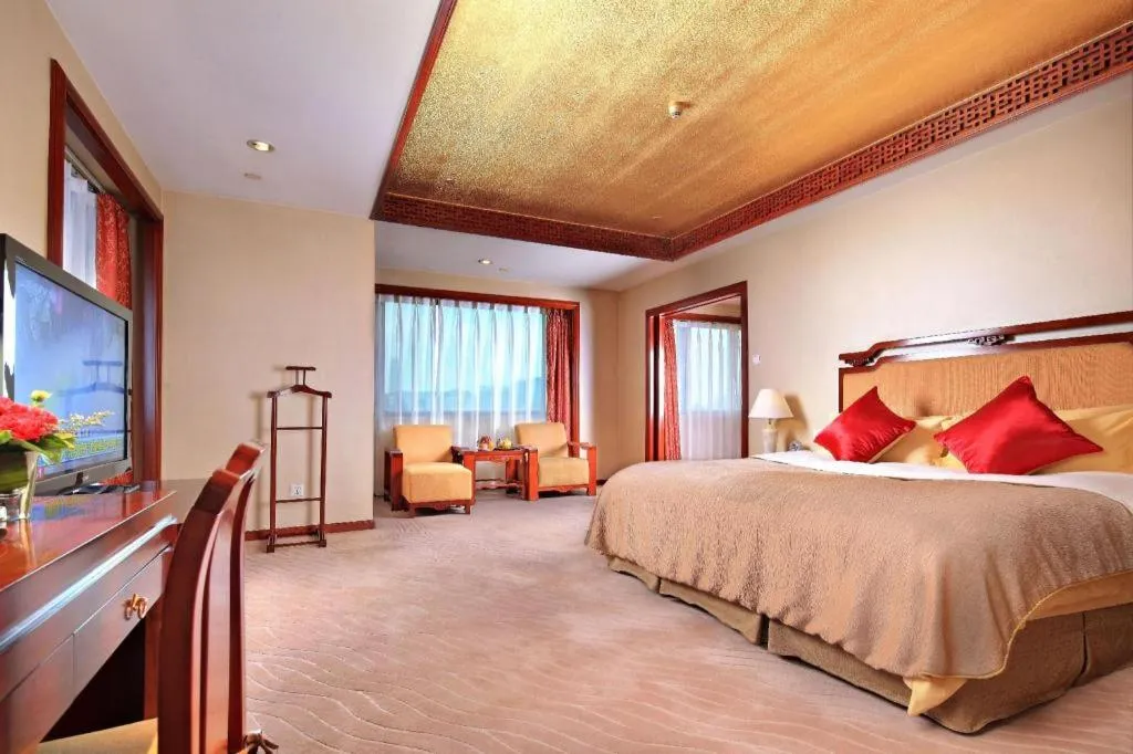 Bed in Xinhai Jinjiang Hotel