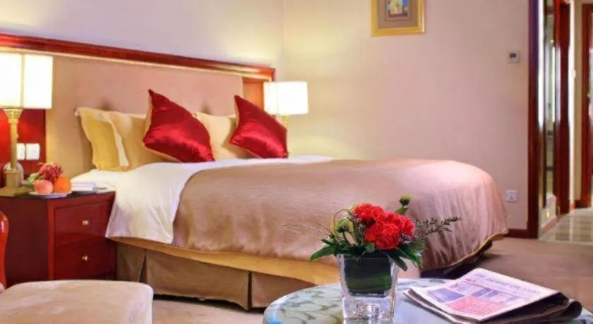 Bed in Xinhai Jinjiang Hotel