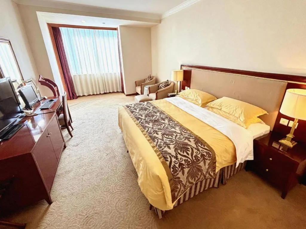 Bed in Xinhai Jinjiang Hotel