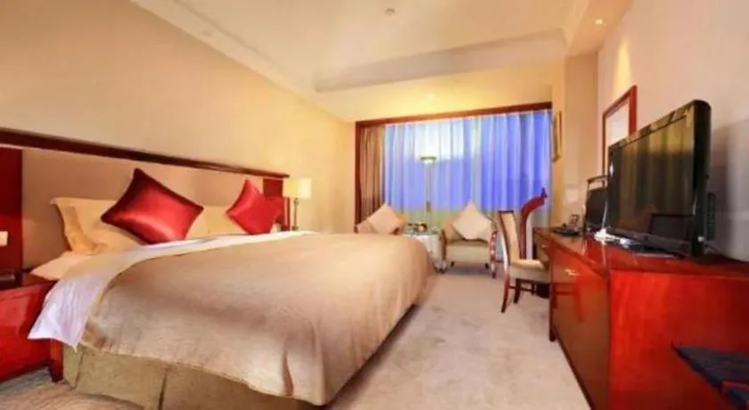 Bed in Xinhai Jinjiang Hotel