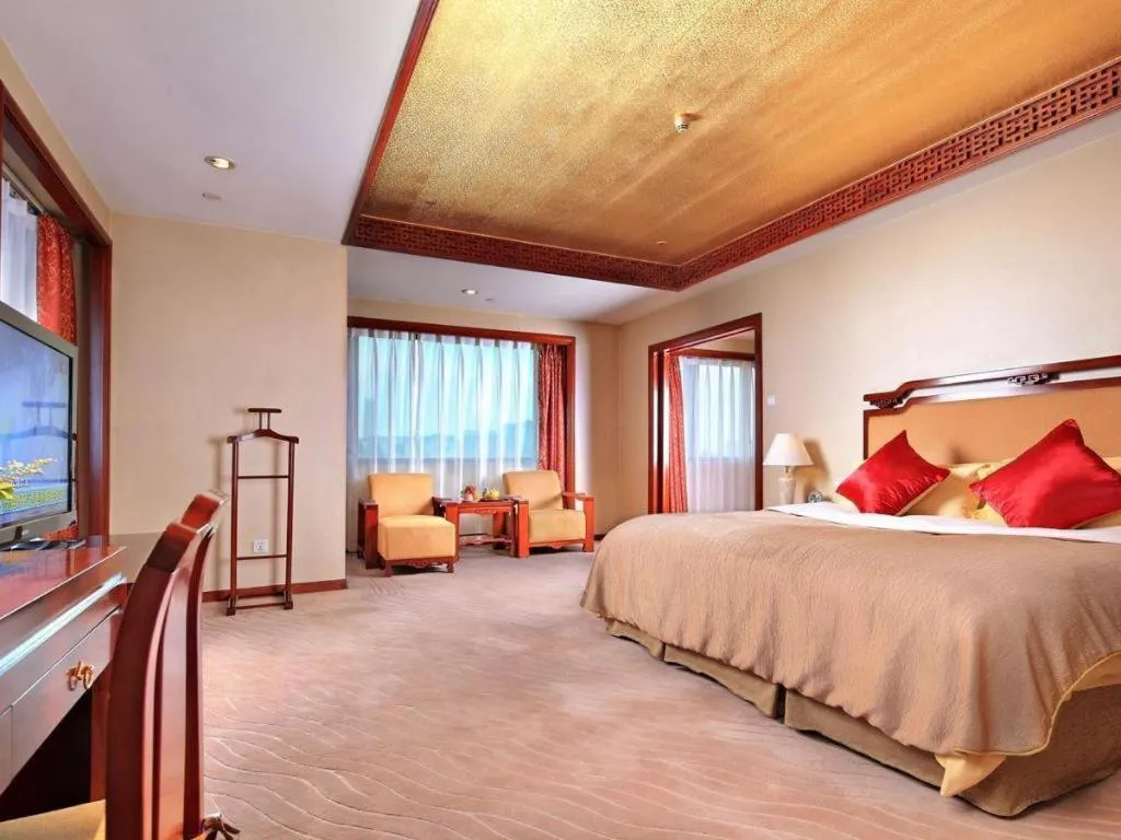 Bed in Xinhai Jinjiang Hotel