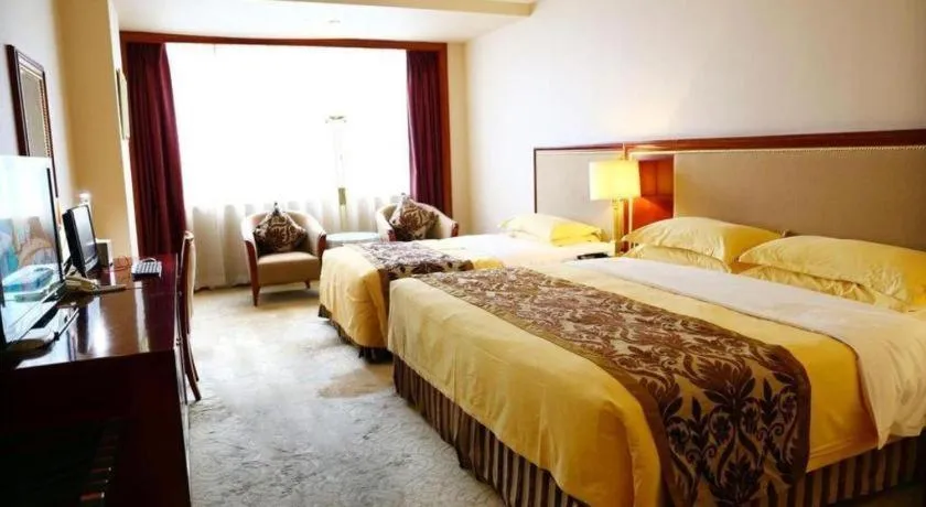 Bed in Xinhai Jinjiang Hotel