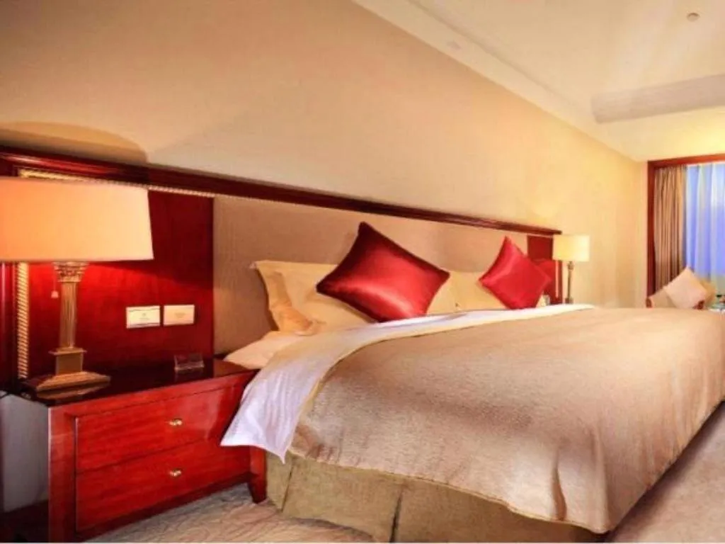 Bed in Xinhai Jinjiang Hotel