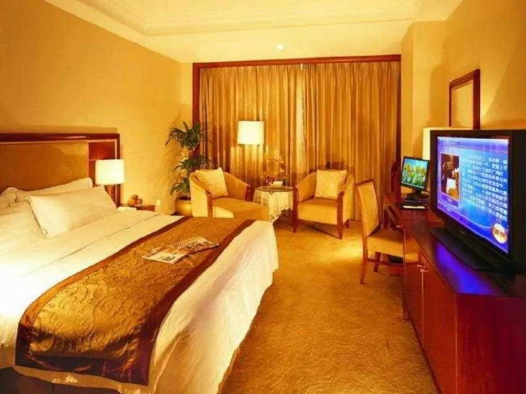 Bed in Xinhai Jinjiang Hotel