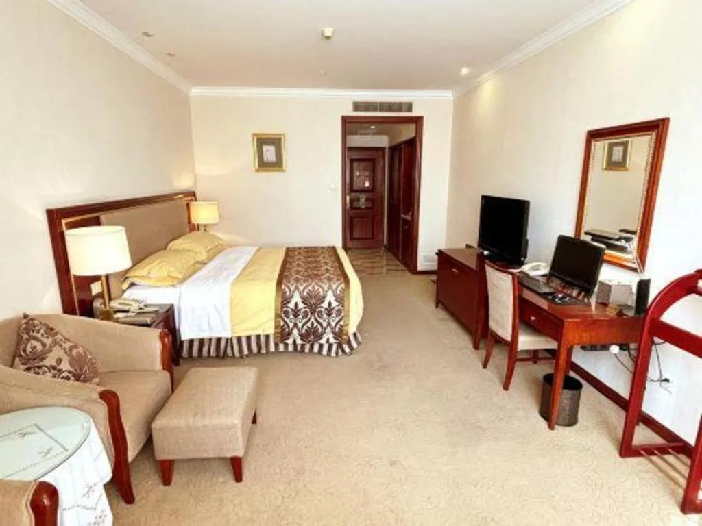 Bed in Xinhai Jinjiang Hotel